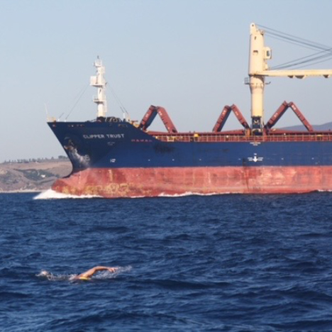 John Kulewicz Swimming with Boat
